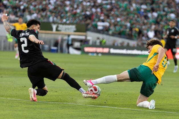 May 30, 2026, Pasadena, California, USA: Mexico s Jorge Sanchez (2) and Australia s Jordan Bos (5) vie for the ball during a MexTour Sendoff Match at Rose Bowl on Saturday, May 30, 2026 in Pasadena, Calif. MexTour Sendoff Match: Mexico Vs Australia  - ZUMAc68_ 20260530_zaf_c68_008 Copyright: xRingoxChiux