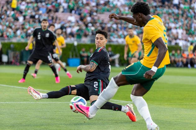 May 30, 2026, Pasadena, California, USA: Australia s Mohamed Toure (9) shoots against Mexico s Jorge Sanchez (2) during a MexTour Sendoff Match at Rose Bowl on Saturday, May 30, 2026 in Pasadena, Calif. MexTour Sendoff Match: Mexico Vs Australia  - ZUMAc68_ 20260530_zaf_c68_016 Copyright: xRingoxChiux