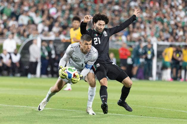 May 30, 2026, Pasadena, California, USA: Australia goalkeeper Mathew Ryan (1) makes save against MexicoÃ¢â‚¬â ¢s Cesar Huerta (21) during a MexTour Sendoff Match at Rose Bowl on Saturday, May 30, 2026 in Pasadena, Calif. MexTour Sendoff Match: Mexico 1:0 Australia  - ZUMAc68_ 20260530_zaf_c68_027 Copyright: xRingoxChiux
