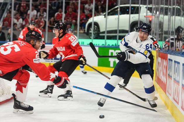 xxkeikkaxx 20260530 Swiss Life Arena, Zurich, Switzerland. IIHF Ice hockey, Eishockey World Championships Semifinal match Canada vs Finland Mikael Granlund (64) of Team Finland attempts a pass as Darnell Nurse (25) of Team Canada intercepts. Photo by Pasi Suokko All Over Press  1.06241231