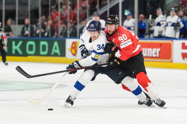 xxkeikkaxx 20260530 Swiss Life Arena, Zurich, Switzerland. IIHF Ice hockey, Eishockey World Championships Semifinal match Canada vs Finland Aatu Räty (34) of Team Finland has an empty net in front of him but Ryan O Reilly (90) of Team Canada manages to defend against him and take the puck away. Photo by Pasi Suokko All Over Press  1.06241339