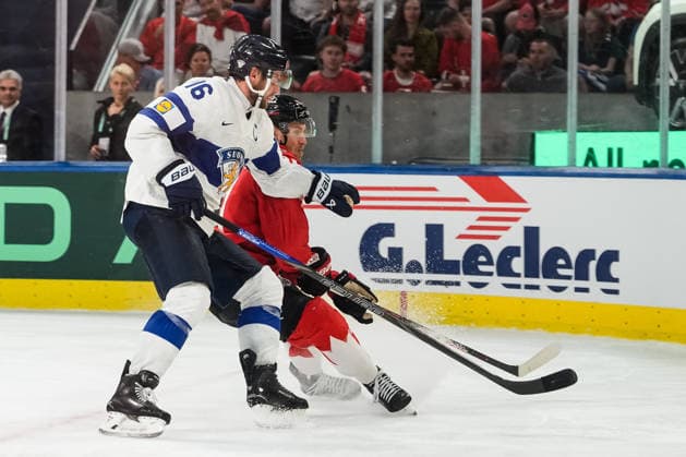 xxkeikkaxx 20260530 Swiss Life Arena, Zurich, Switzerland. IIHF Ice hockey, Eishockey World Championships Semifinal match Canada vs Finland Aleksander Barkov (16) of Team Finland defends against a Canadian forward. Photo by Pasi Suokko All Over Press  1.06241250