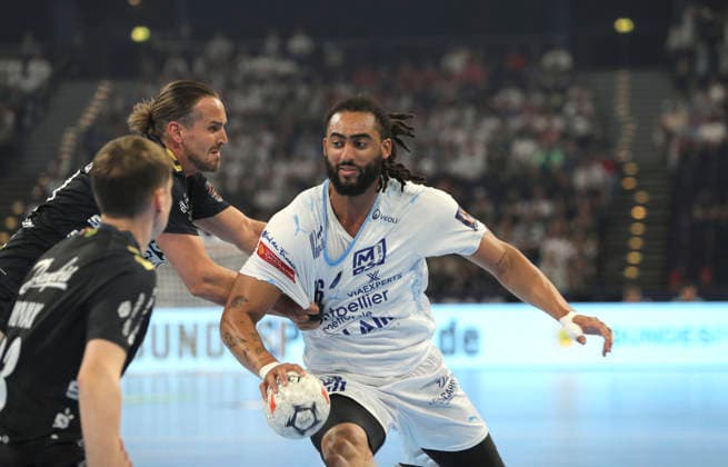 photo Hugo Bryan MONTE dos SANTOS against Kent Robin Tönnesen Tonnesen Flensburg Handball Men on Sun 31 05 2026 Mens EHF European League , Final Four in Hamburg SG Flensburg Montpellier HB Match for 3rd place