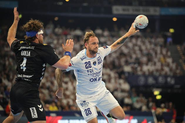 photo on the ball Valentin PORTE Montpellier against Johannes Golla Flensburg Handball Men on Sun 31 05 2026 Mens EHF European League , Final Four in Hamburg SG Flensburg Montpellier HB Match for 3rd place