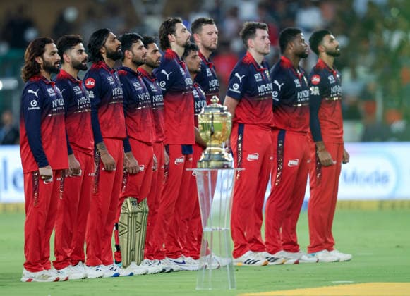 IPL 2026 Final, RCB vs GT Ahmedabad, May 31 (ANI): Royal Challengers Bengaluru players stand for the national anthem before the Indian Premier League 2026 Final match against Gujarat Titans at Narendra Modi Stadium, in Ahmedabad on Sunday. Ahmedabad Gujarat India Copyright: xANIx ANI_20260531334