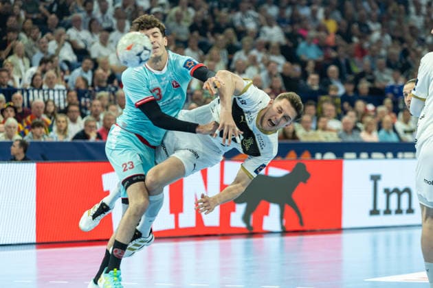 Marti Soler Biescas MT Melsungen and Bence Imre THW Kiel battle for the ball during the handball final of the Winamax EHF Finals 2026 between THW Kiel and MT Melsungen at Barclays Arena on May 31, 2026 in Hamburg, Germany