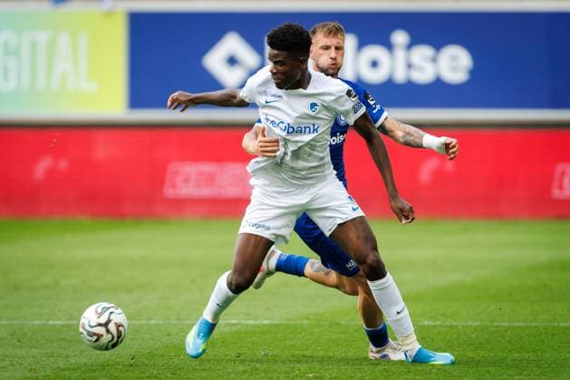 Genk s Aaron Bibout Banind and Gent s Hyunseok Hong fight for the ball during a soccer match between KAA Gent and Racing Genk, Sunday 31 May 2026 in Gent, an European Play-off game of the 2025-2026 Jupiler Pro League first division of the Belgian championship. KURTxDESPLENTER  x175554802x