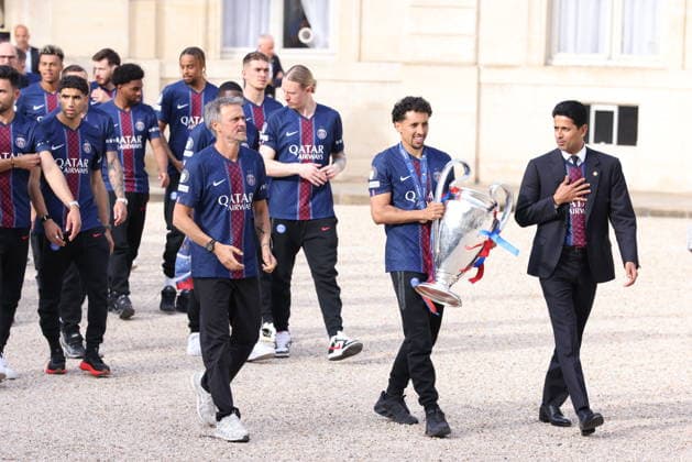 Ceremony at the Elysee for 2026 PSG UEFA Victory – Paris Captain Marquinhos carrying The Trophy with UEFA Champions League winner Paris Saint-Germain Team, , Spanish coach Luis Enrique and Qatari president Nasser al-Khelaifi arriving for a reception at the Elysee presidential palace in Paris, France on May 31, 2026, a day after PSG won the 2026 final football match against Arsenal in Budapest. Photo by Jerome Domine ABACAPRESS.COM Paris France  Copyright: xDominexJerome ABACAx