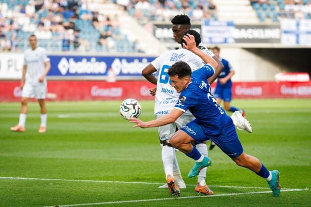 Genk s Christian Akpan and Gent s Abdelkahar Kadri fight for the ball during a soccer match between KAA Gent and Racing Genk, Sunday 31 May 2026 in Gent, an European Play-off game of the 2025-2026 Jupiler Pro League first division of the Belgian championship. KURTxDESPLENTER  x175555951x