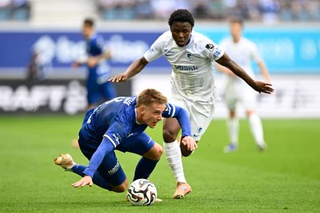KAA Gent v KRC Genk - Jupiler Pro League Europe Play-Off Decider GENT, BELGIUM - MAY 31 : Akpan Christian midfielder of KRC Genk in action with Skoras Michal forward of KAA Gent during the Jupiler Pro League Europe Play-Off decider match with the last European Conference League ticket at stake between KAA Gent and KRC Genk on May 31, 2026 in Gent, Belgium, 31 05 2026 Gent Belgium  Copyright: xNicoxVereeckenx