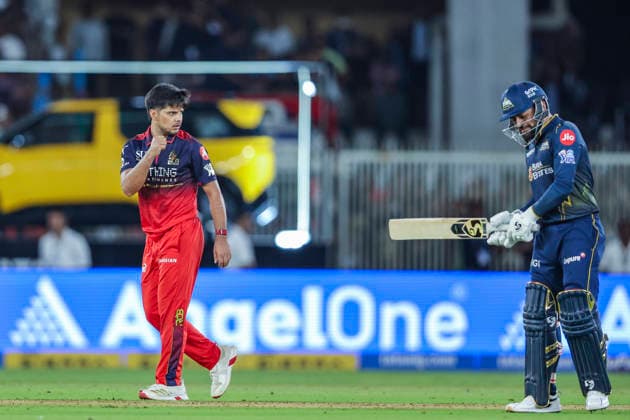 IPL 2026 Final, RCB vs GT Ahmedabad, May 31 (ANI): Royal Challengers Bengaluru s Rasikh Salam Dar celebrates the wicket of Gujarat Titans Rashid Khan during their Indian Premier League 2026 Final match at Narendra Modi Stadium, in Ahmedabad on Sunday. Ahmedabad Gujarat India Copyright: xANIx ANI_20260531414