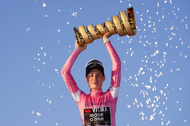Denmark™s Jonas Vingegaard Hansen of Team Visma Lease A Bike (Pink jersey) winner of the race on the podium with the trophy (trofeo senza fine) during Stage 21 of the Giro d™Italia from Rome to Rome, Italy. Monday May 31, 2026  Copyright: xFabioxFerrari LaPressex