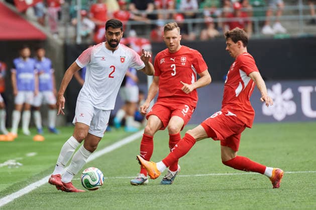 Soccer World Cup 2026 preparation match Switzerland vs. Jordan, St Gallen, Switzerland St Gallen, Switzerland 31 May 2026 Mohammad Abu Hasheesh is pressured by Silvan Widmer and Christian Fassnacht during the World Cup 2026 preparation match Switzerland vs. Jordan in St Gallen