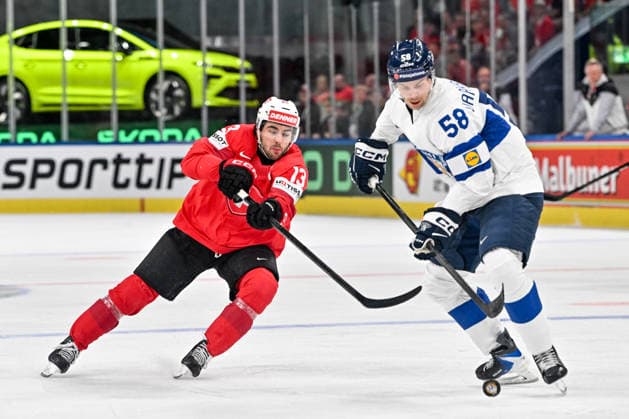 ZURICH, SWITZERLAND MAY 31 Urho Vaakanainen of Finland R protects the puck from Nico Hischier of Switzerland L during the 2026 IIHF Ice Hockey World Championship Switzerland Gold Medal game between Switzerland and Finland at Swiss Life Arena on May 31, 2026 in Zurich, Zurich Zurich Swiss Life Arena Zurich Switzerland Copyright: xJustPictures.ch AndreaxBrancax jp-en-EuSpIm-JP7_ANB_SuiFin_31052026_8726