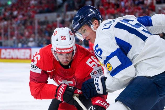 260531 Tim Berni of Switzerland and Anton Lundell of Finland during the 2026 IIHF Ice Hockey World Championship final between Switzerland and Finland on May 31, 2026 in Zürich Photo Jesper Zerman BILDBYRAN kod JZ JZ0742 ishockey ice hockey ishockey vm 2026 vm 2026 iihf world championship final switzerland schweiz finland bbeng  Copyright: JESPERxZERMAN BB260531JZ152