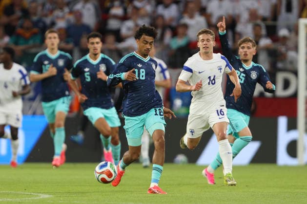 Nathaniel Brown Germany and Anssi Suhonen Finland battle for the ball during the international friendly match between Germany and Finland at MEWA Arena on May 31, 2026 in Mainz, Germany Photo by Oliver Kaelke DeFodi Images