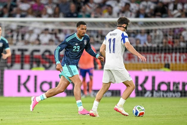 Felix Nmecha Germany and Adam Marhiev Finland battle for the ball during the international friendly match between Germany and Finland at MEWA Arena on May 31, 2026 in Mainz, Germany Photo by Harry Langer DeFodi Images