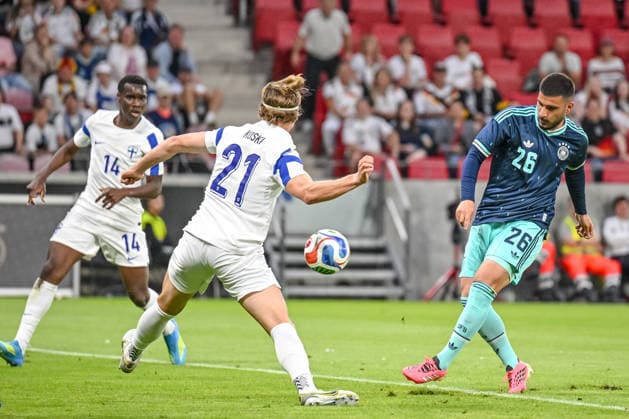 Ville Koski Finland and Deniz Undav Germany battle for the ball during the international friendly match between Germany and Finland at MEWA Arena on May 31, 2026 in Mainz, Germany Photo by Harry Langer DeFodi Images