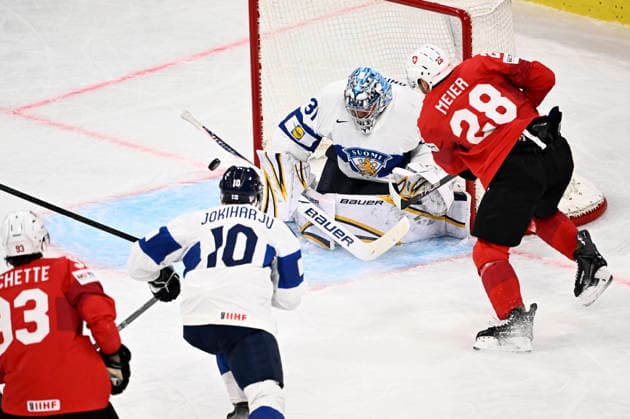 LKS 20260531 Goalkeeper 31 Justus Annunen and 10 Henri Jokiharju of Finland eye the puck with 28 Timo Meier of Switzerland during the 2026 IIHF Ice hockey, Eishockey World Championships final match between Switzerland and Finland in Zurich on May 31, 2026. - RONI REKOMAA Zürich Switzerland I2S-CSOXsLk  Copyright: xRonixRekomaax I2S-CSOXsLk