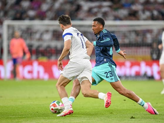 Adam Marhiev Finland and Felix Nmecha Germany battle for the ball during the international friendly match between Germany and Finland at MEWA Arena on May 31, 2026 in Mainz, Germany Photo by Harry Langer DeFodi Images