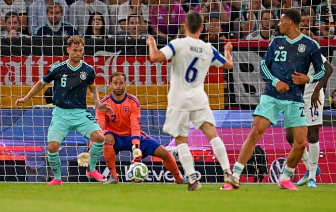 31 05 2026, Football friendly international match 3 match day, Germany Finland, in the Mewa Arena Mainz, f l Joshua Kimmich Germany , goalkeeper Oliver Baumann Germany Leo Walta Finland and Felix Nmecha Germany