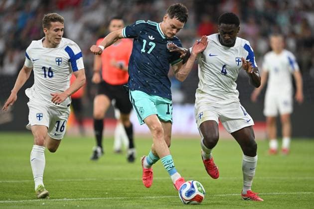 International soccer match Germany Finland on 31 05 2026 in the Mewa Arena in Mainz Anssi Suhonen Finland , left Florian Wirtz Germany , center Tony Miettinen Finland , right DFB regulations prohibit any use of photographs as image sequences and or quasi video xJKx