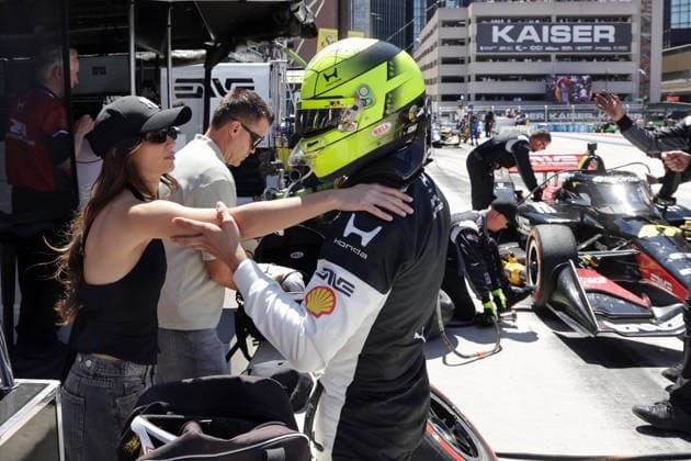 Girlfriend Clara Ramos POR consoles Mick Schumacher GER Honda 47 after the race, behind him is advisor Dirk Müller GER at the RLL pit stand, GP Detroit, Michigan, USA, 31 05 2026, Indycar Series, US Motorsport, Rahal lettermann Lanigan Racing