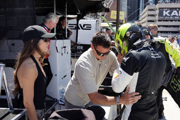 Girlfriend Clara Ramos POR watches as Bearter Dirk Müller GER Mick Schumacher GER Honda 47 cheers up after the race, GP Detroit, Michigan, USA, 31 05 2026, Indycar Series, US Motorsport, RLL pit stand, Rahal lettermann Lanigan Racing