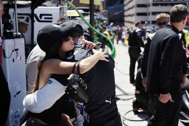 Girlfriend Clara Ramos POR hugs Mick Schumacher GER Honda 47 after the race, RLL pit stand, GP Detroit, Michigan, USA, 31 05 2026, Indycar Series, US Motorsport, Rahal lettermann Lanigan Racing