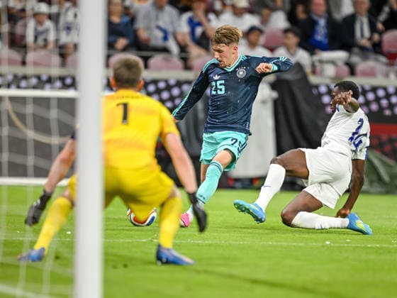 Goalkeeper Lukas Hradecky Finland , Lennart Karl Germany and Ryan Mahuta Finland battle for the ball during the international friendly match between Germany and Finland at MEWA Arena on May 31, 2026 in Mainz, Germany Photo by Harry Langer DeFodi Images