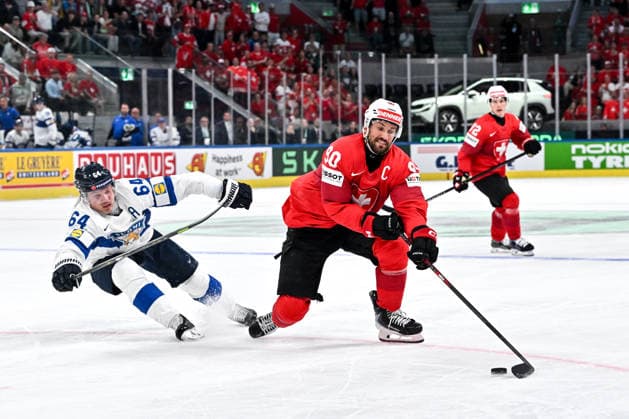 ZURICH, SWITZERLAND MAY 31 Roman Josi of Switzerland in action chased by Mikael Granlund of Finland during the 2026 IIHF Ice Hockey World Championship Switzerland Gold Medal game between Switzerland and Finland at Swiss Life Arena on May 31, 2026 in Zurich, Zurich Zurich Swiss Life Arena Zurich Switzerland Copyright: xJustPictures.ch AndreaxBrancax jp-en-EuSpIm-JP7_ANB_SuiFin_31052026_9376