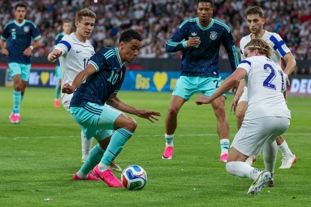 Jamal Musiala 10 Germany in action against Ville Koski 21 Finland , Germany vs Finland, Football, Men, UEFA, Friendly, Friendly Match, DFB, Season 2025 2026, 31 05 2026 Mainz Rhineland-Palatinate Germany Copyright: xkolbert-press MartinxAgüerax