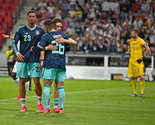 31 05 2026, Football friendly international match 3 matchday, Germany Finland, in the Mewa Arena Mainz, f l Felix Nmecha Germany , Florian Wirtz Germany and Deniz Undav Germany cheer goalkeeper Lukas Hradecky Finland is disappointed