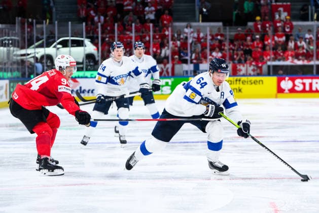 260531 Attilio Biasca of Switzerland and Mikael Granlund of Finland during the 2026 IIHF Ice Hockey World Championship final between Switzerland and Finland on May 31, 2026 in Zürich Photo Jesper Zerman BILDBYRAN kod JZ JZ0742 ishockey ice hockey ishockey vm 2026 vm 2026 iihf world championship final switzerland schweiz finland bbeng  Copyright: JESPERxZERMAN BB260531JZ185