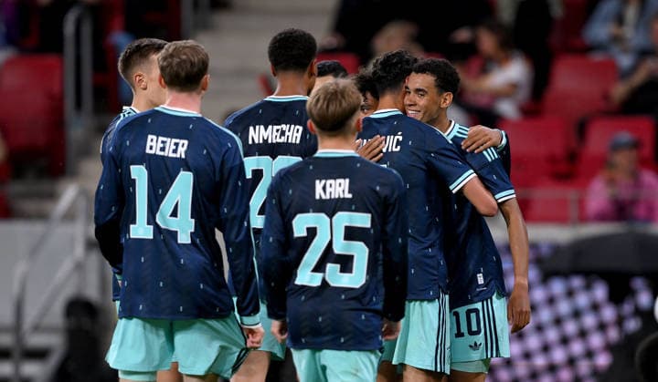 Soccer International Test match World Cup 2026 in Mainz Germany Finland 31 05 2026 Cheering Germany after the goal to 4 0, from left, Aleksandar Pavlovic with goal scorer Jamal Musiala