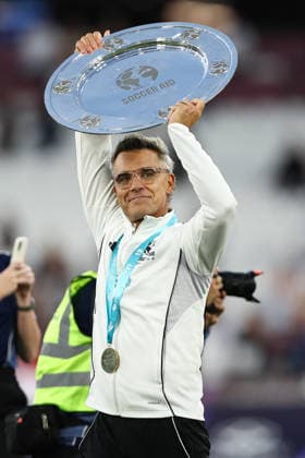 London, England, 31st May 2026. Robbie Williams of England lifts the trophy following victory during the England vs Soccer Aid World XI UNICEF Soccer Aid match at the London Stadium, London. Picture credit should read: Jake Youle Sportimage EDITORIAL USE ONLY. No use with unauthorised audio, video, data, fixture lists, club league logos or live services. Online in-match use limited to 120 images, no video emulation. No use in betting, games or single club league player publications. SPI_040_England_World_XI SPI-4829-0036