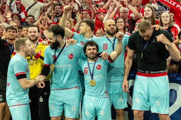 The Players of MT Melsungen celebrate after the win in front of the Supporters during the handball final of the Winamax EHF Finals 2026 between THW Kiel and MT Melsungen at Barclays Arena on May 31, 2026 in Hamburg, Germany