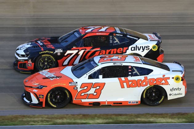 NASHVILLE, TN - MAY 31: Bubba Wallace ( 23 23XI Racing Hardee s Toyota) races with Michael McDowell ( 71 Spire Motorsports Garner Trucking Chevrolet) into turn 3 during the running of the NASCAR, Motorsport, USA Cup Series Cracker Barrel 400 on May 31, 2026 at Nashville Superspeedway in Lebanon, TN. (Photo by Jeff Robinson Icon Sportswire) AUTO: MAY 31 NASCAR Cup Series Cracker Barrel 400 EDITORIAL USE ONLY Icon26053120702400