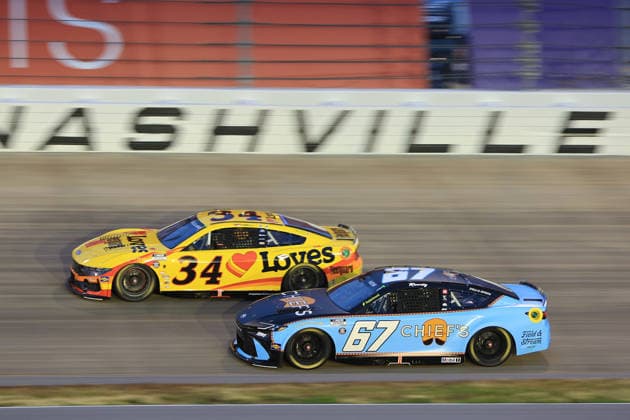 NASHVILLE, TN - MAY 31: Corey Heim ( 67 23XI Racing Chief s Toyota) races with Todd Gilliland ( 34 Front Row Motorsports Love s Travel Stops Fleetguard Mustang Dark Horse Ford) into turn 3 during the running of the NASCAR, Motorsport, USA Cup Series Cracker Barrel 400 on May 31, 2026 at Nashville Superspeedway in Lebanon, TN. (Photo by Jeff Robinson Icon Sportswire) AUTO: MAY 31 NASCAR Cup Series Cracker Barrel 400 EDITORIAL USE ONLY Icon26053121049400