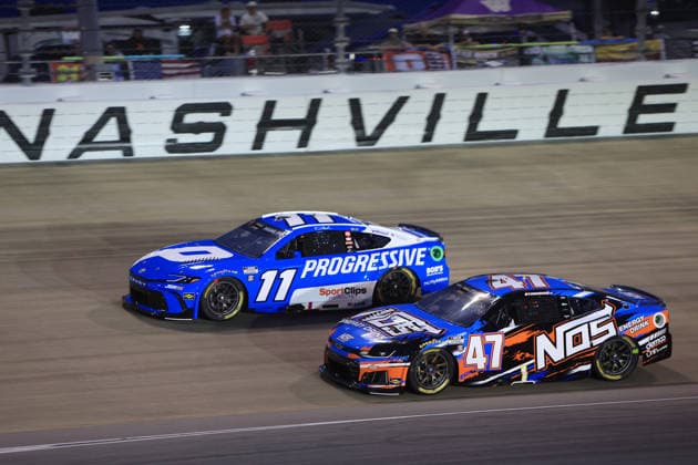 NASHVILLE, TN - MAY 31: Ricky Stenhouse Jr ( 47 Hyak Motorsports NOS Energy Chevrolet) races with Denny Hamlin ( 11 Joe Gibbs Racing Progressive Insurance Toyota) into turn 2 during the running of the NASCAR, Motorsport, USA Cup Series Cracker Barrel 400 on May 31, 2026 at Nashville Superspeedway in Lebanon, TN. (Photo by Jeff Robinson Icon Sportswire) AUTO: MAY 31 NASCAR Cup Series Cracker Barrel 400 EDITORIAL USE ONLY Icon26053121311400