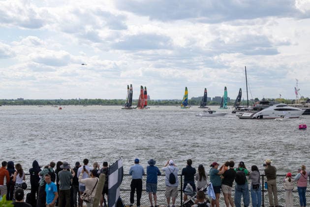 2026 Rolex SailGP Championship Mubadala New York Sail Grand Prix - Day 2, USA - 31 May 2026 Spectators on Governor s Island watch the SailGP F50 catamaran fleet sails at the start of Race 2 during Day 2 of the Mubadala New York Sail Grand Prix at New York Harbor. New York United States Copyright: xRonxAdarx xSOPAxImagesx _radar_sailgp_20260531_02137