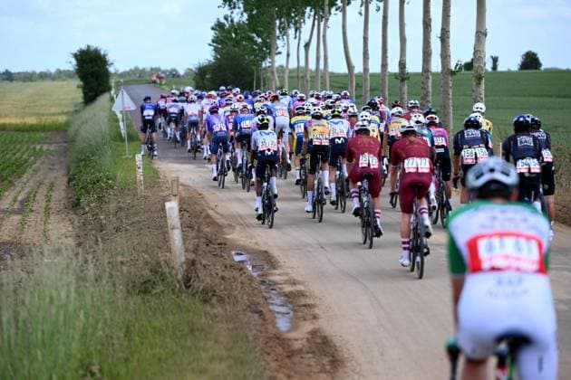 Tour de Wallonie 2026 Stage 1 LOBBES, BELGIUM - JUNE 01 : Race is being neutralised due to mud on the road during stage 1 of the 47th edition of Ethias Tour de Wallonie an UCI ProSeries 2.Pro cycling road race stage for Men Elite of 180.7 km with start in Manage and finish in Lobbes on June 1, 2026 in Lobbes, Belgium, 01 06 2026 ( Motordriver Pieter Van Herzele - Lobbes Belgium  Copyright: xVincentxKalutx