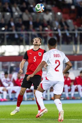 SOCCER - AUT vs TUN, test match VIENNA,AUSTRIA,01.JUN.26 - SOCCER - OEFB international test match, Austria vs Tunisia. Image shows Stefan Posch (AUT) and Ali Abdi (TUN).  GEPAxpictures xArminxRauthner
