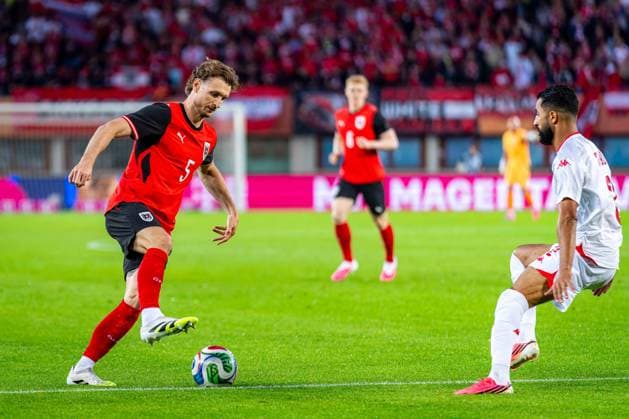 SOCCER - AUT vs TUN, test match VIENNA,AUSTRIA,01.JUN.26 - SOCCER - OEFB international test match, Austria vs Tunisia. Image shows Stefan Posch (AUT) and Ali Abdi (TUN).  GEPAxpictures xKevinxHackner