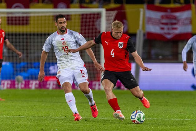 SOCCER - AUT vs TUN, test match VIENNA,AUSTRIA,01.JUN.26 - SOCCER - OEFB international test match, Austria vs Tunisia. Image shows Rani Khedira (TUN) and Xaver Schlager (AUT).  GEPAxpictures xPhilippxBrem