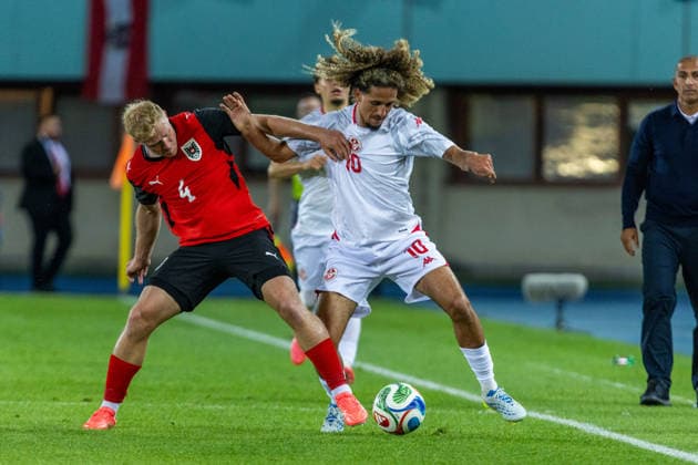 SOCCER - AUT vs TUN, test match VIENNA,AUSTRIA,01.JUN.26 - SOCCER - OEFB international test match, Austria vs Tunisia. Image shows Xaver Schlager (AUT) and Hannibal Mejbri (TUN).  GEPAxpictures xPhilippxBrem