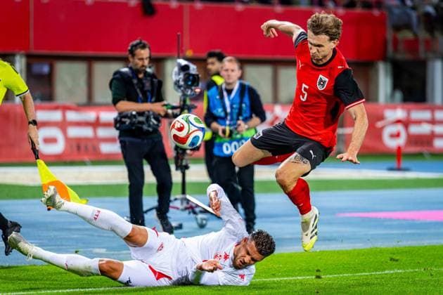 SOCCER - AUT vs TUN, test match VIENNA,AUSTRIA,01.JUN.26 - SOCCER - OEFB international test match, Austria vs Tunisia. Image shows Omar Rekik (TUN) and Stefan Posch (AUT).  GEPAxpictures xKevinxHackner