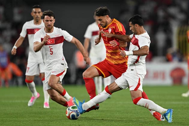 Turkiye v North Macedonia - Friendly match ISTANBUL, TURKIYE - JUNE 1: Zeki Celik (R) and Salih Ozcan (R) of Turkiye in action against Eljif Elmas (C) of North Macedonia during the International Friendly, Länderspiel, Nationalmannschaft match between Turkiye and North Macedonia at Chobani Stadium, on June 1, 2026, in Istanbul, Turkiye. Ahmet Okatali Anadolu Istanbul Turkey. Editorial use only. Please get in touch for any other usage.  Copyright: x2026xAnadoluxAhmetxOkatalix