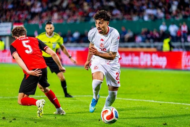 SOCCER - AUT vs TUN, test match VIENNA,AUSTRIA,01.JUN.26 - SOCCER - OEFB international test match, Austria vs Tunisia. Image shows Stefan Posch (AUT) and Sebastian Tounekti (TUN).  GEPAxpictures xKevinxHackner
