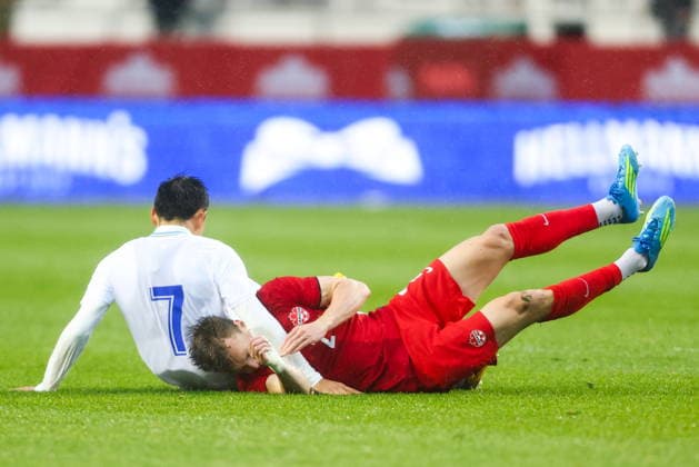 June 1, 2026, Edmonton, Ab, CANADA: Canada s Alistair Johnston (2) is tackled by Uzbekistan s Otabek Shukurov (7) during first half World Cup Friendly soccer action in Edmonton on Monday, June 1, 2026. Canada News - June 1, 2026  - ZUMAc35_ 20260601_zaf_c35_086 Copyright: xCodiexMclachlanx